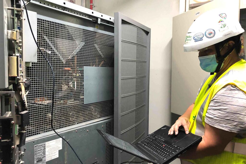 DCX Power Team performing data center UPS power startup service