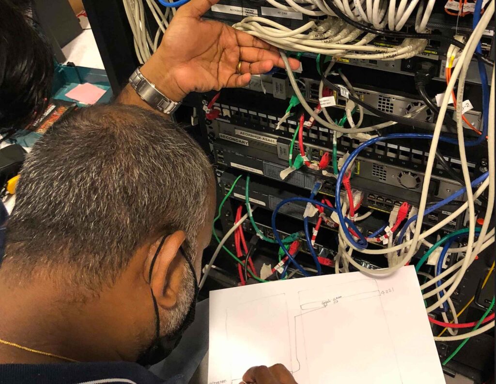 DCX Team performing cloud migration servers audit and labeling